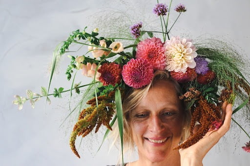 Floral designer Lexi Richards wearing a custom floral headpiece