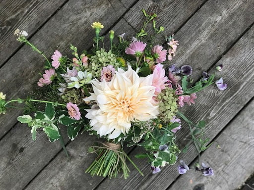 Muted pastels colour palette hand-tied flower bouquet